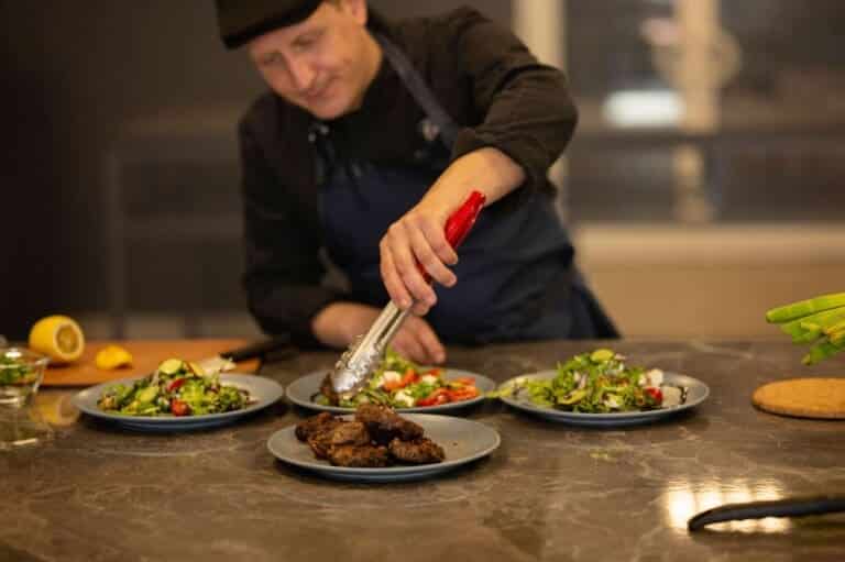 Chef preparing a dish in a home kitchen