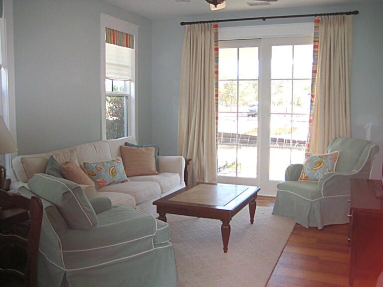 Bright coastal cottage living room interior