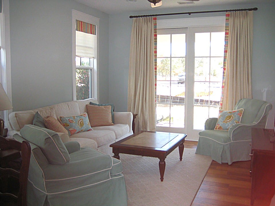 Bright coastal cottage living room interior